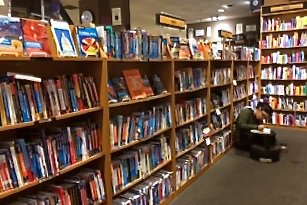 shelf full of guidebooks at bookstore in Arizona